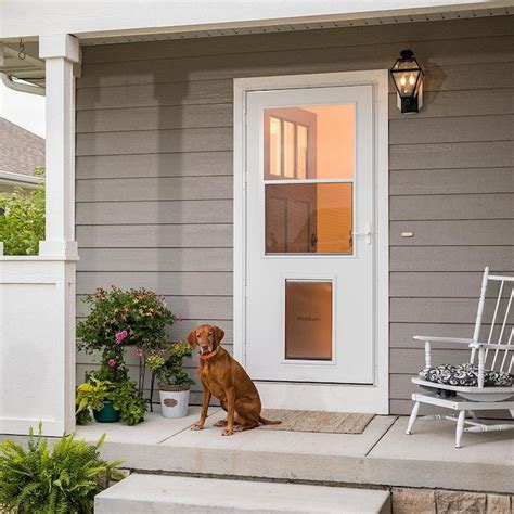 Lowes storm doors with doggie door - LARSON Pet View 36-in x 81-in White Full-view Self-storing Aluminum Storm Door with White Handle. Adding a pet door just got easier. The Pet View storm door fits pets up to 100 lbs. and features a factory installed 10-in x 17-in pet door and inside security panel. View More 
